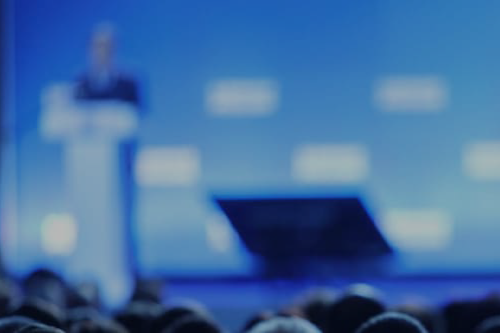 Event banner image, view of a symposium