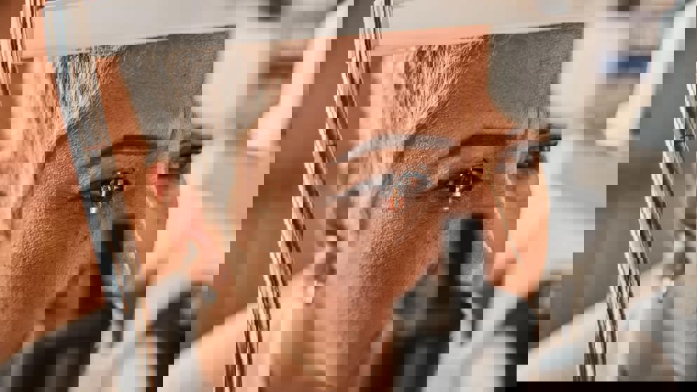 Patient having eye exam, banner image