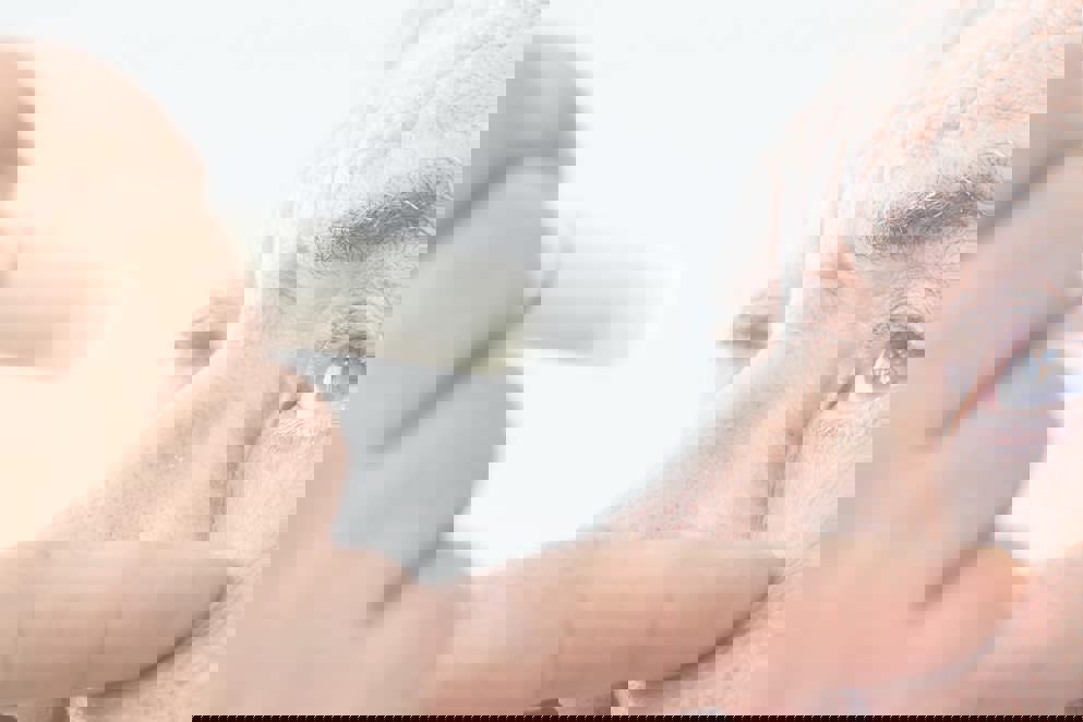 Elderly man examined by an ophthalmologist