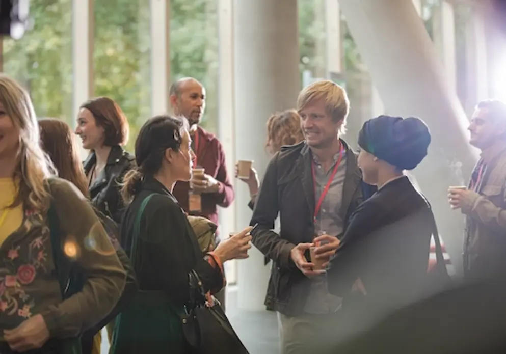 People in coversation at conference