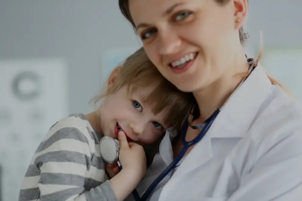 Improving treatment options for child psoriasis banner image, child and doctor